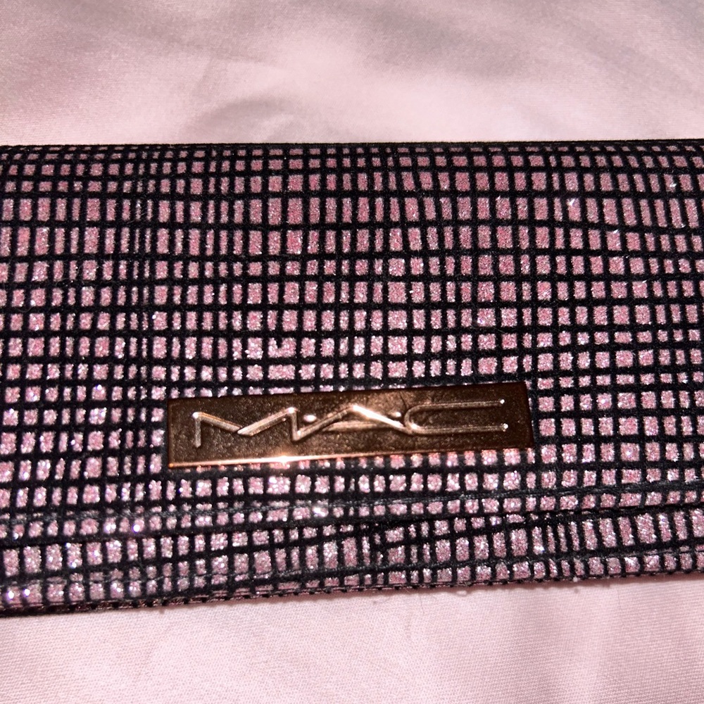 MAC Clutch- magenta and black metallic.